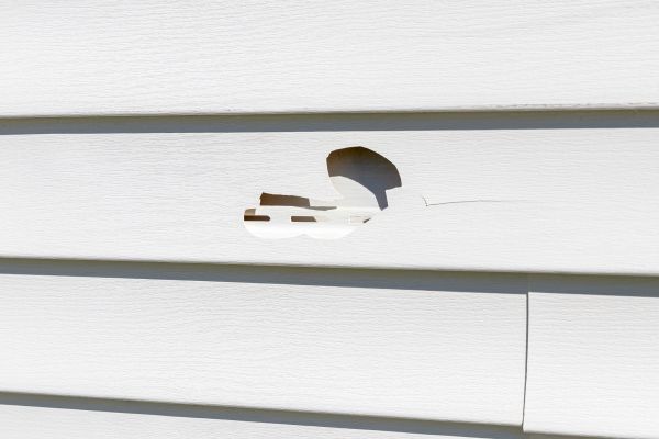 White Vinyl Siding Repair in Concord
